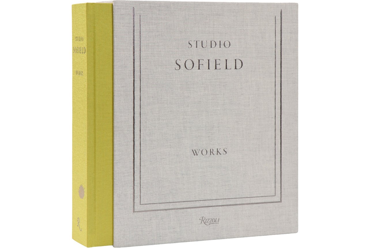 A fashion book cover with a canvas exterior and a yellow bind labeled “Studio Sofield: Works”