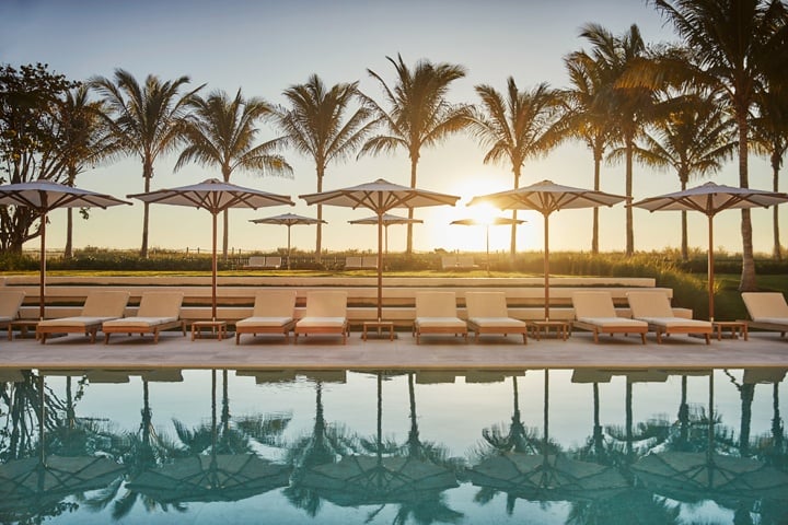 The pool at the Four Seasons at The Surf Club calls for a moment of reflection—and relaxation.