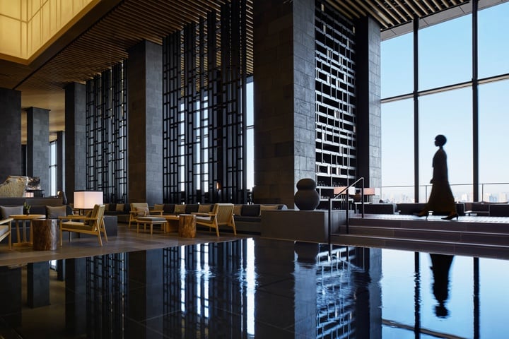 Aman Tokyo's contemporary lobby overlooks the bustling city.