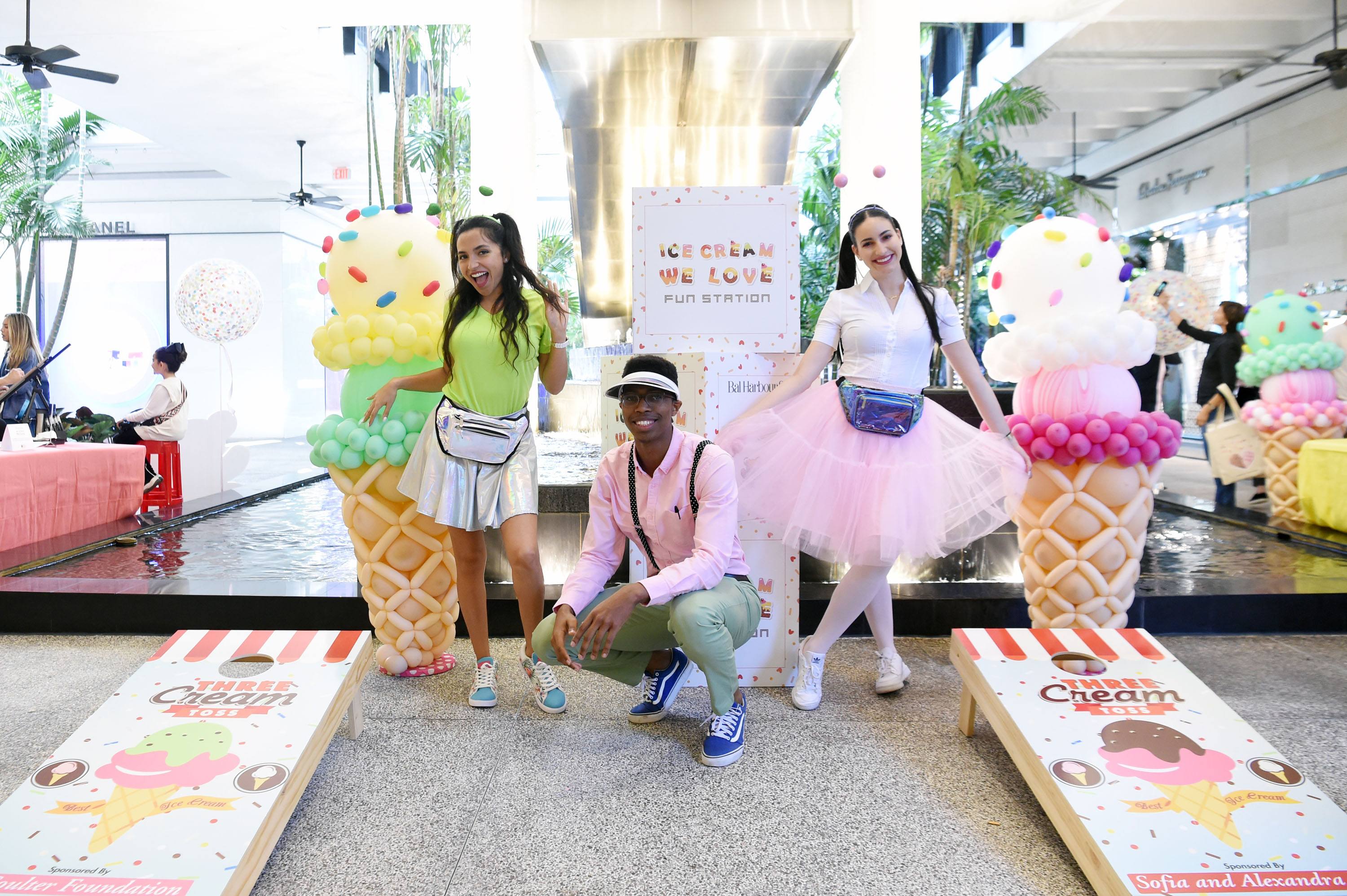 fun station featured giant ice cream cone balloons and game toss