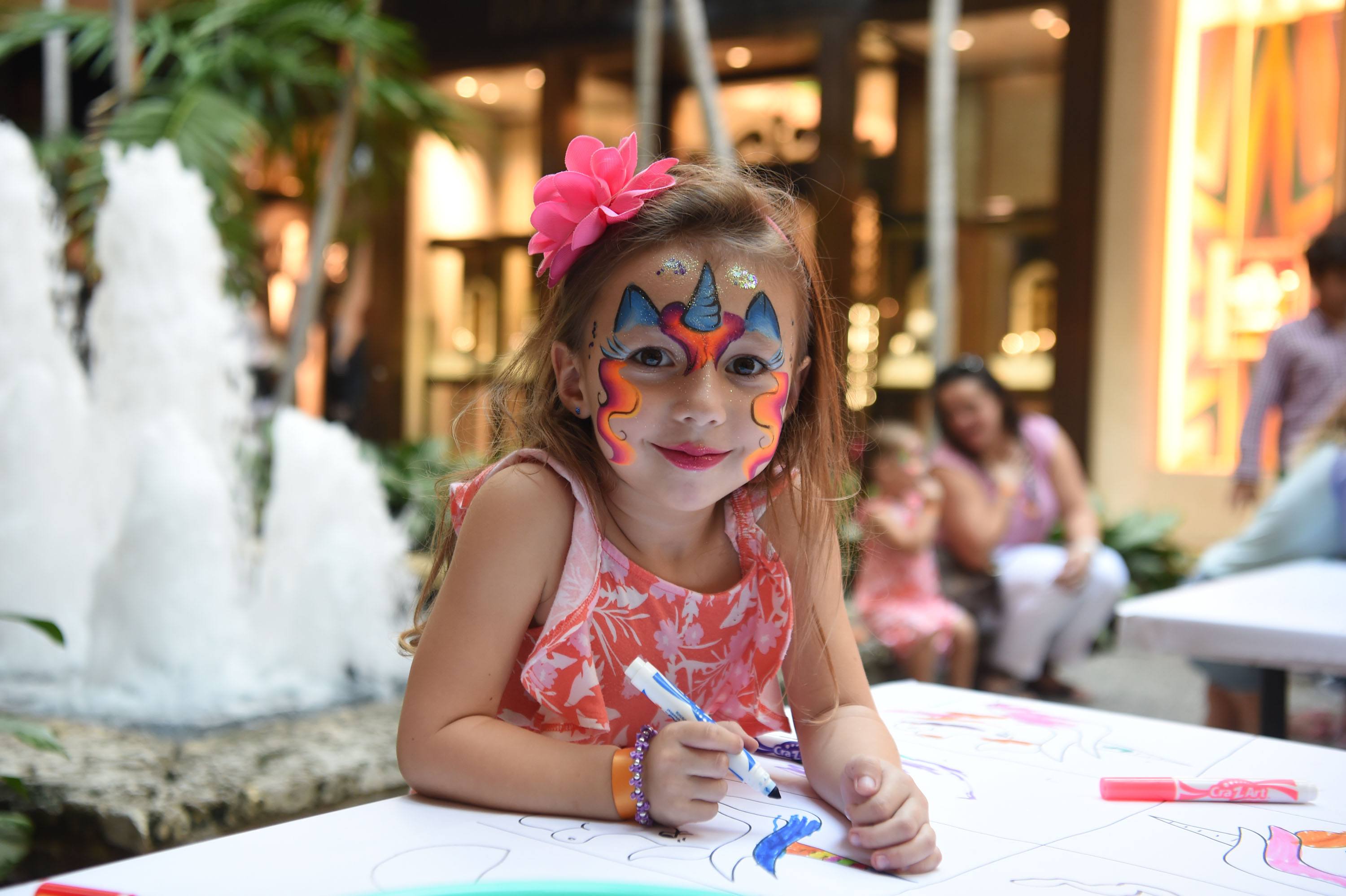 Kids enjoyed drawing on the graffiti tables