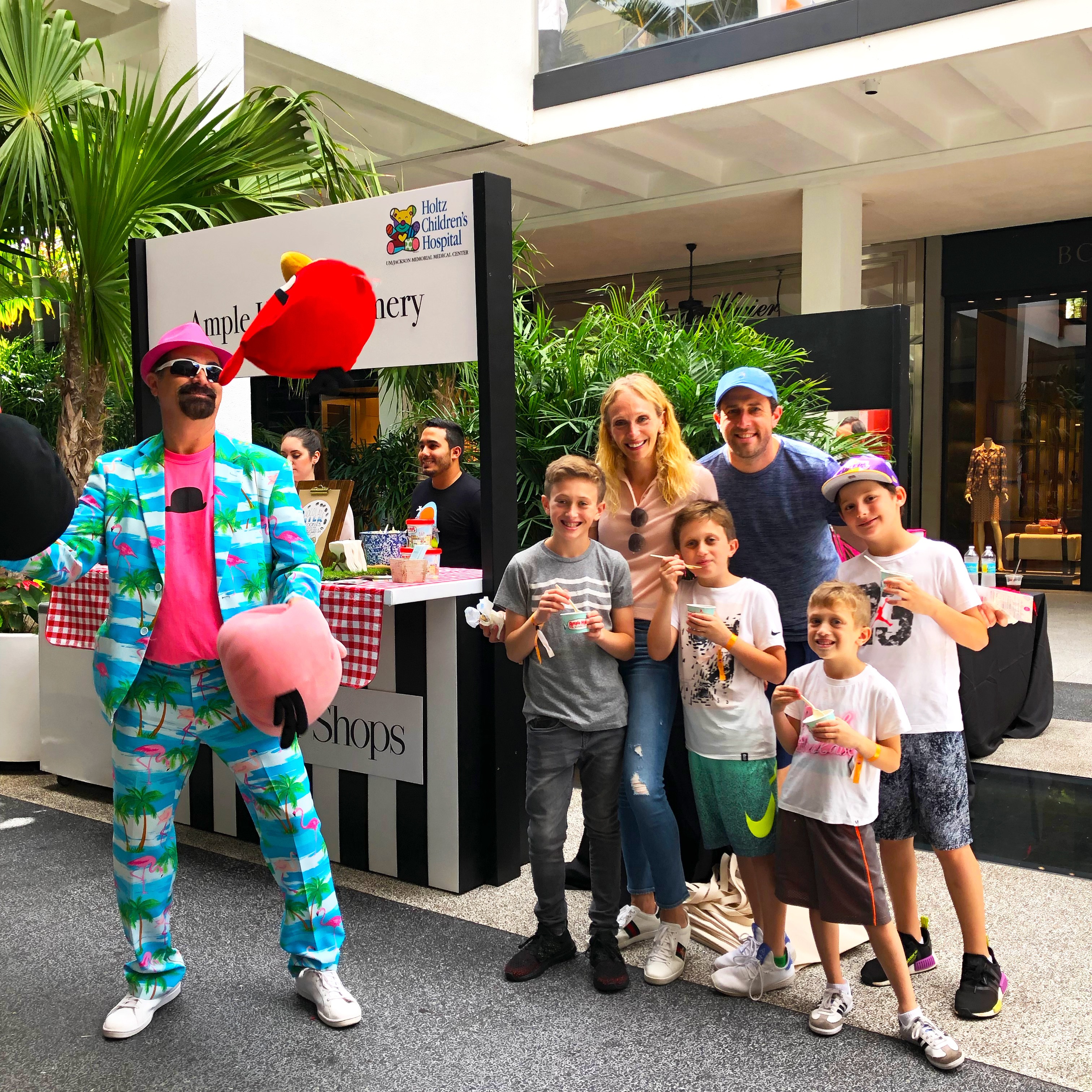 Juggler and Family in front of Ample Hills Creamery booth