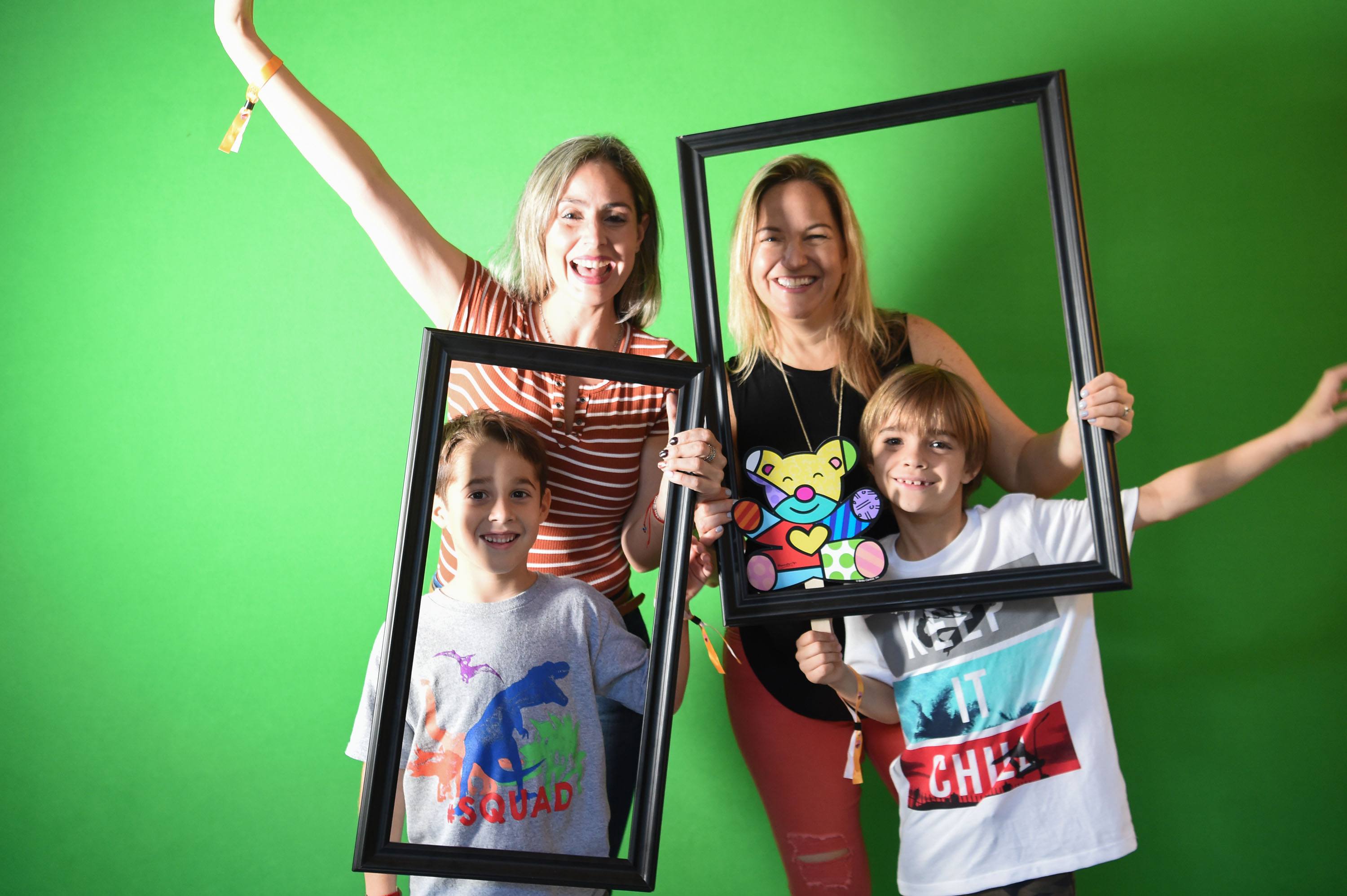 Family and friends enjoyed taking their photos at the photo booth station