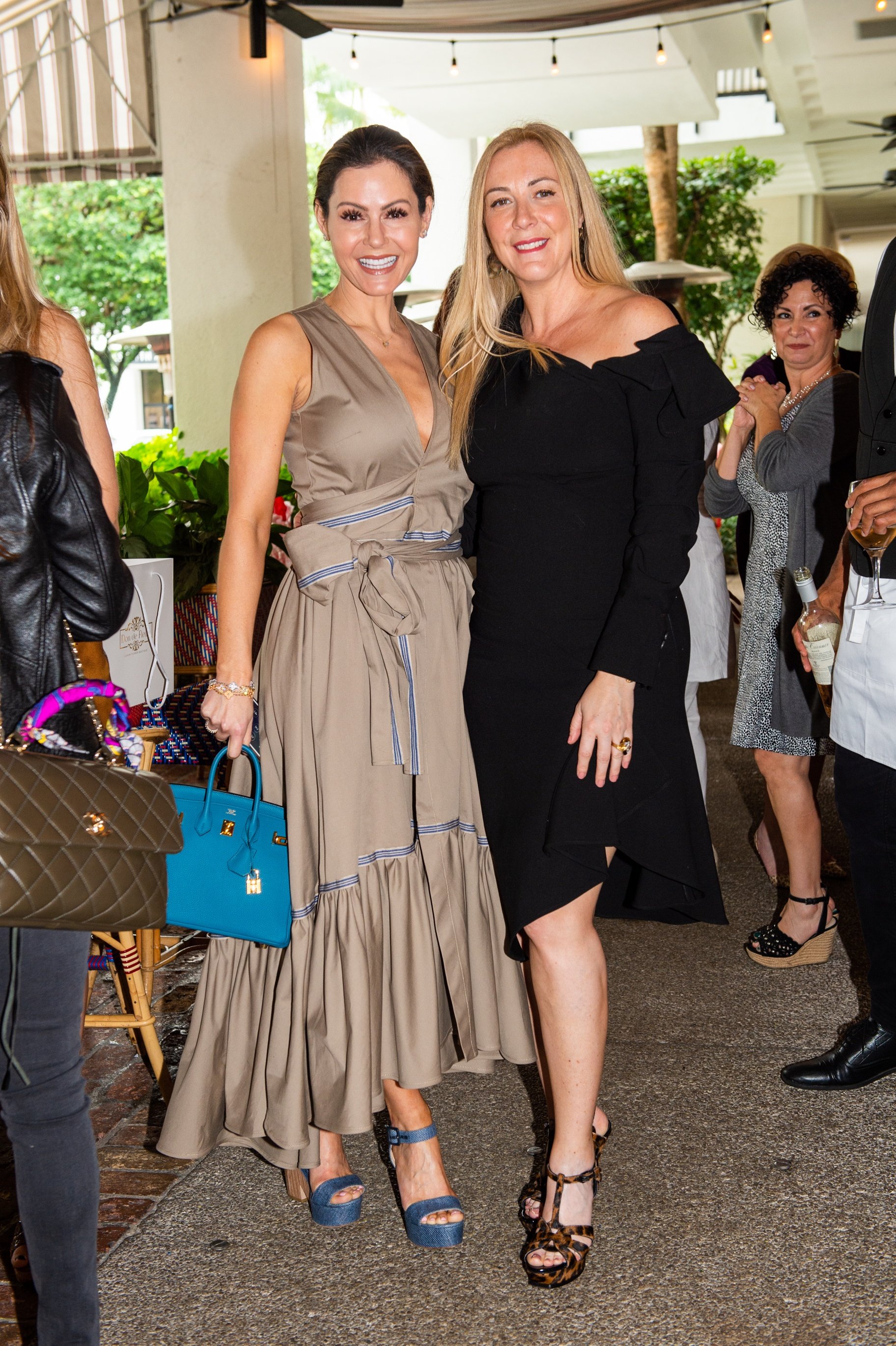 Ladies enjoying the luncheon benefiting Walk in Style for the Animals at Le Zoo Bal Harbour