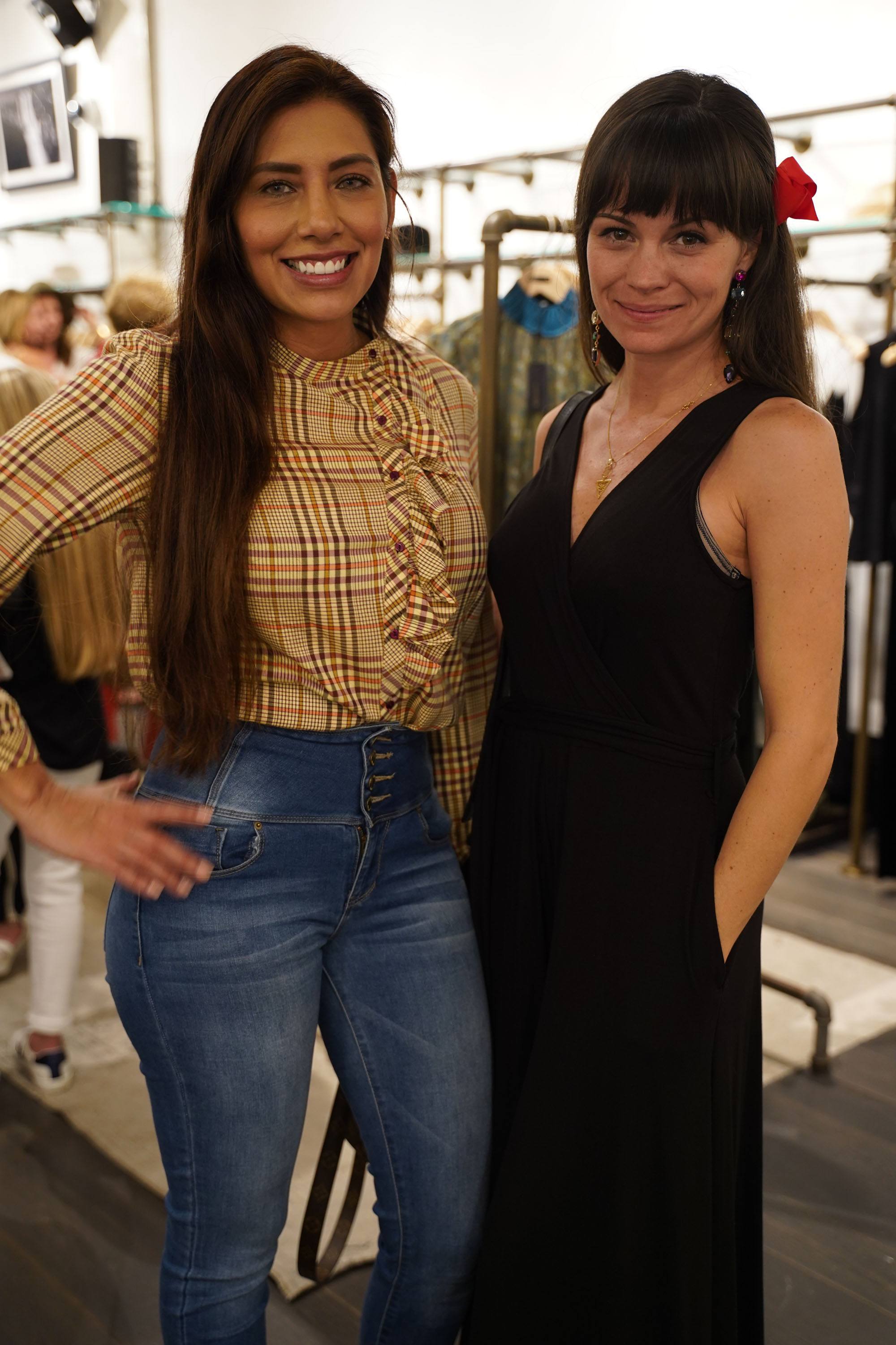 Geselle Helfers & Cassandra Youngs pose for a picture at Rag & Bone Bal Harbour celebrating the fundraiser for The Childhood Cancer Project