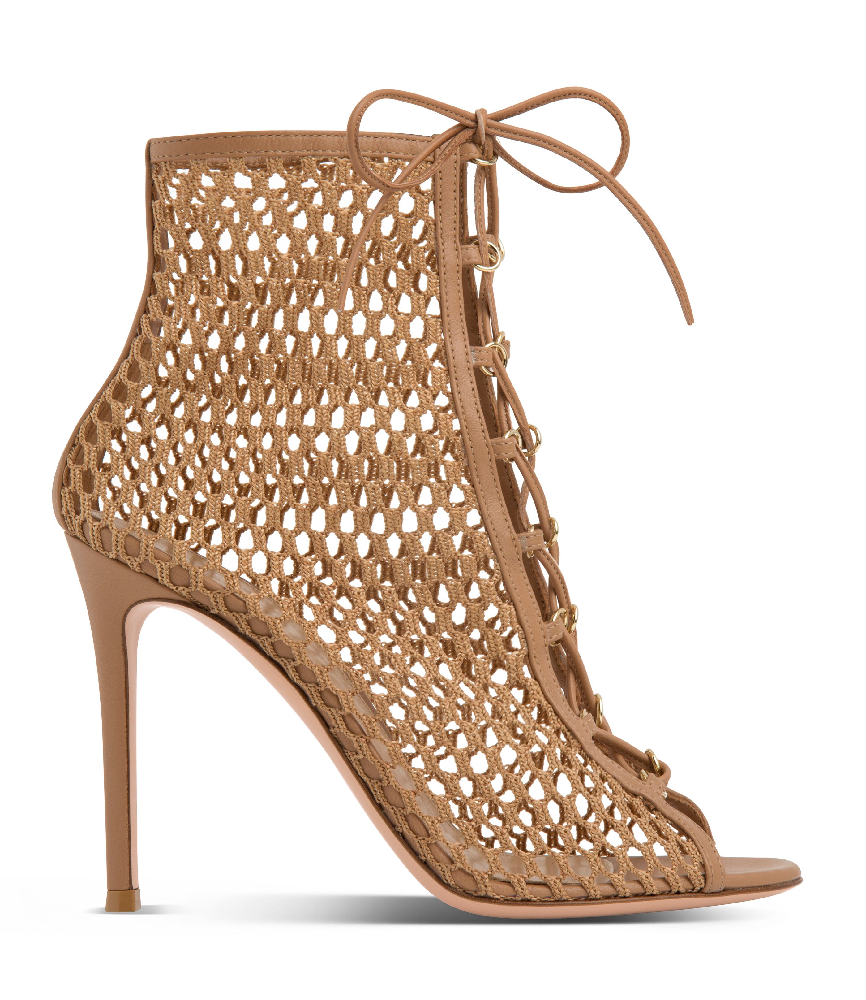 Set on a 105mm stiletto heel, the lace-up open toe Gianvito Rossi Helena Bootie is made of ultra-soft fabric. The mesh in Praline color wraps around the ankle in a sensual game of hide-and-seek and creates an illusion of sheer skin camouflage.