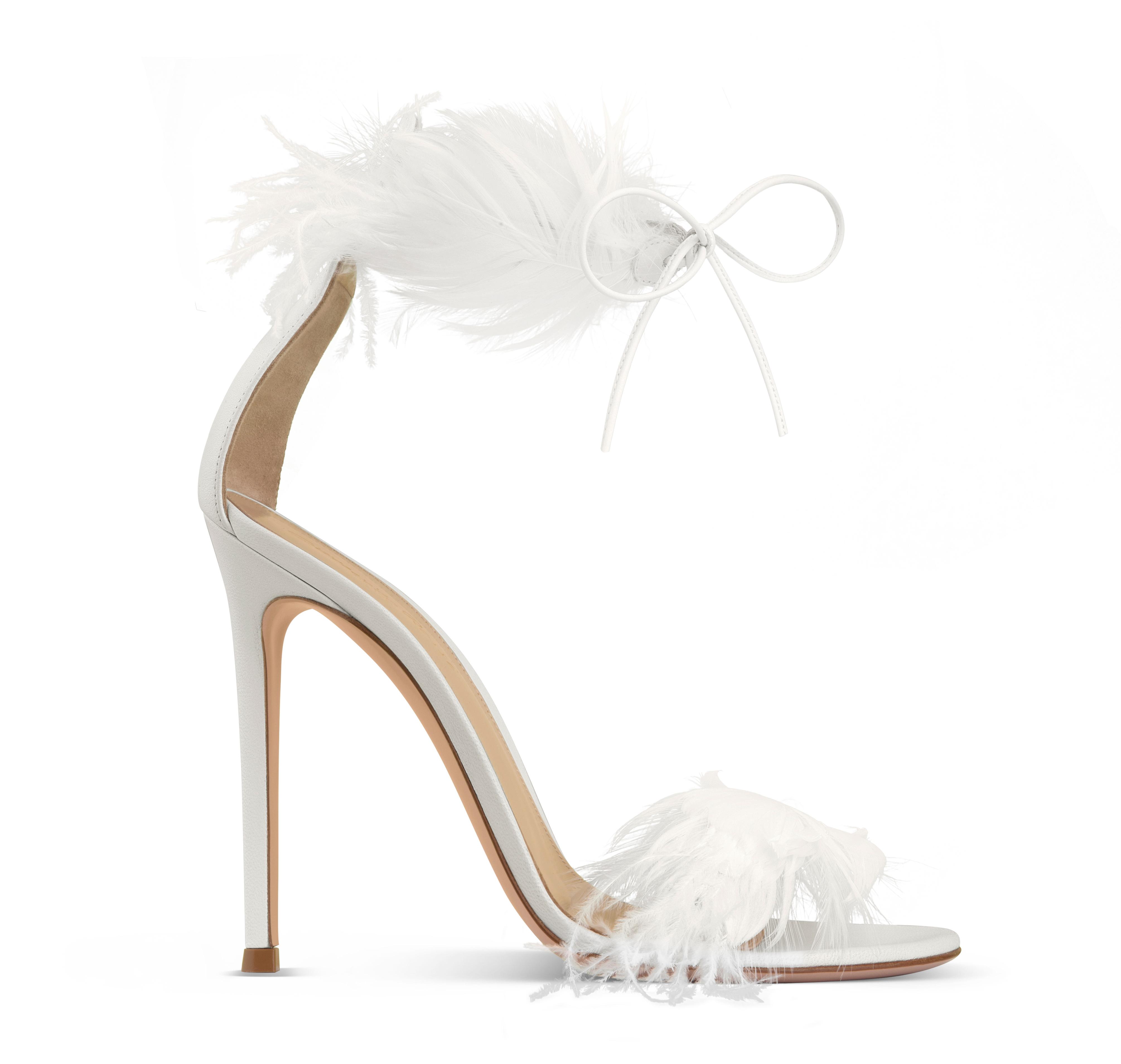 Delicate white feathers enrich the ankle strap and toe band of the Athena sandal. Finished with a 105mm stiletto heel, is showcased further with tone-on-tone feathers.