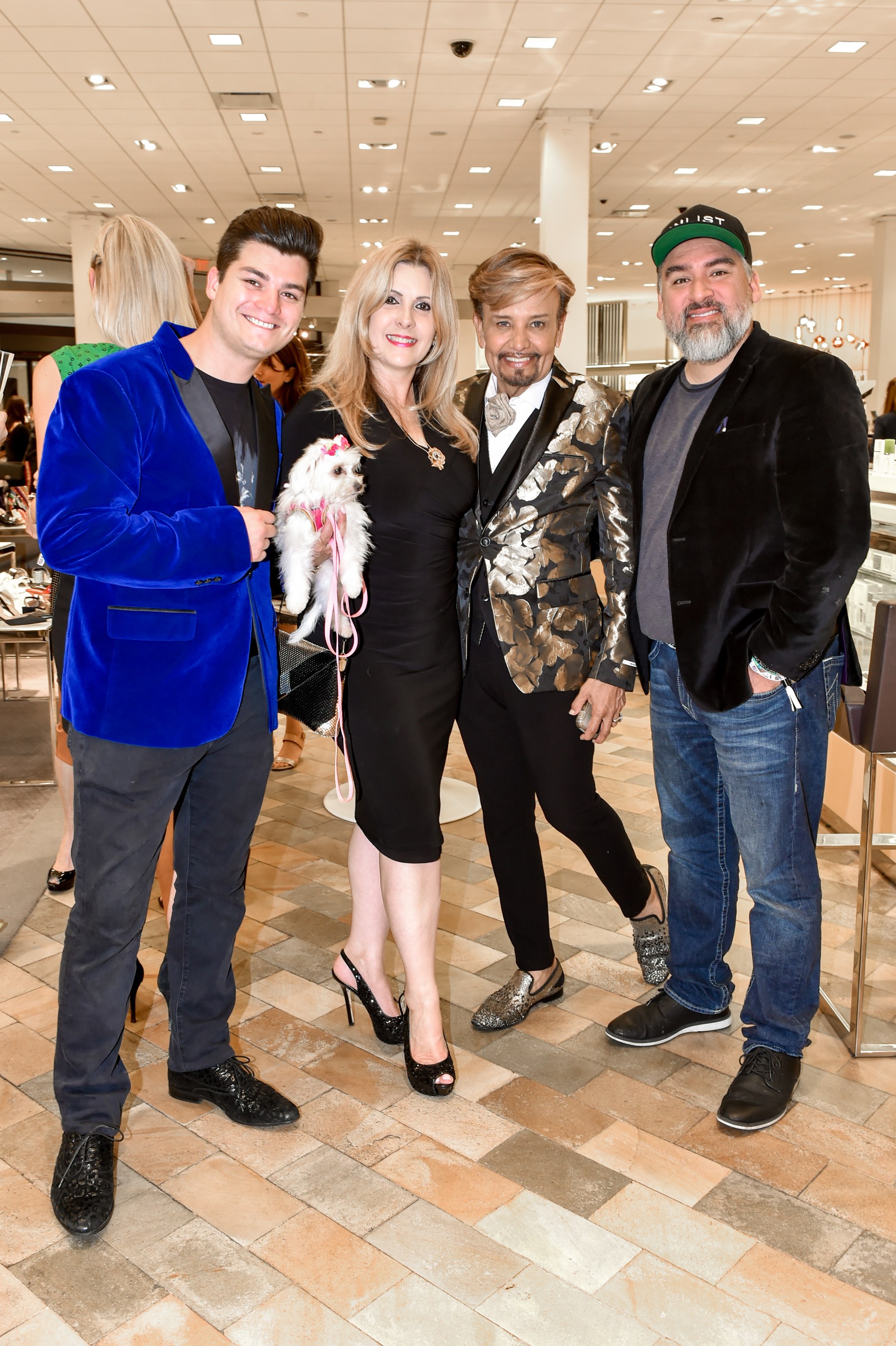 Lizzette Piedra and Oscar Romero with friends inside Neiman Marcus Bal Harbour