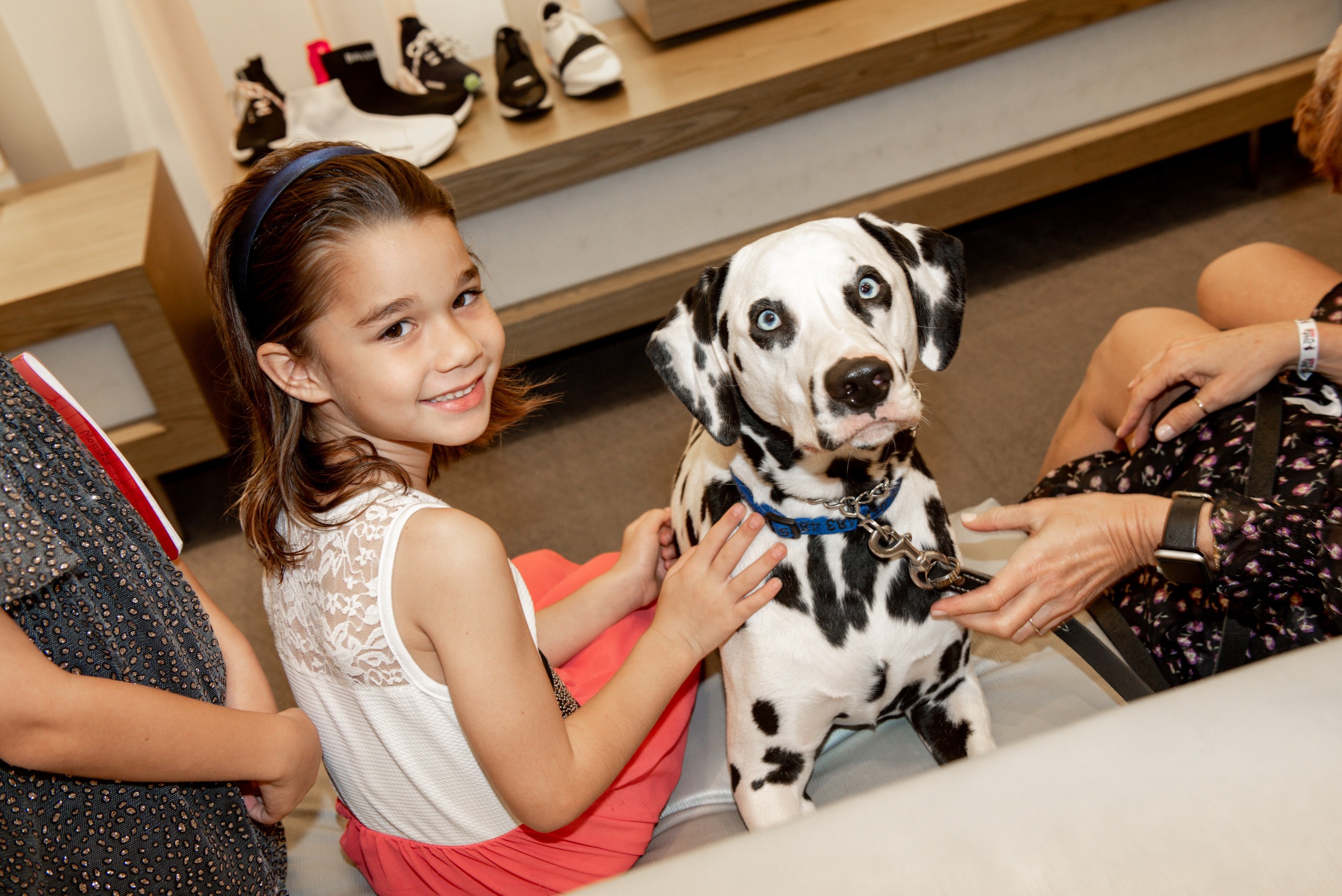 Child and dog at Walk in Style for the Animals at Neiman Marcus Bal Harbour