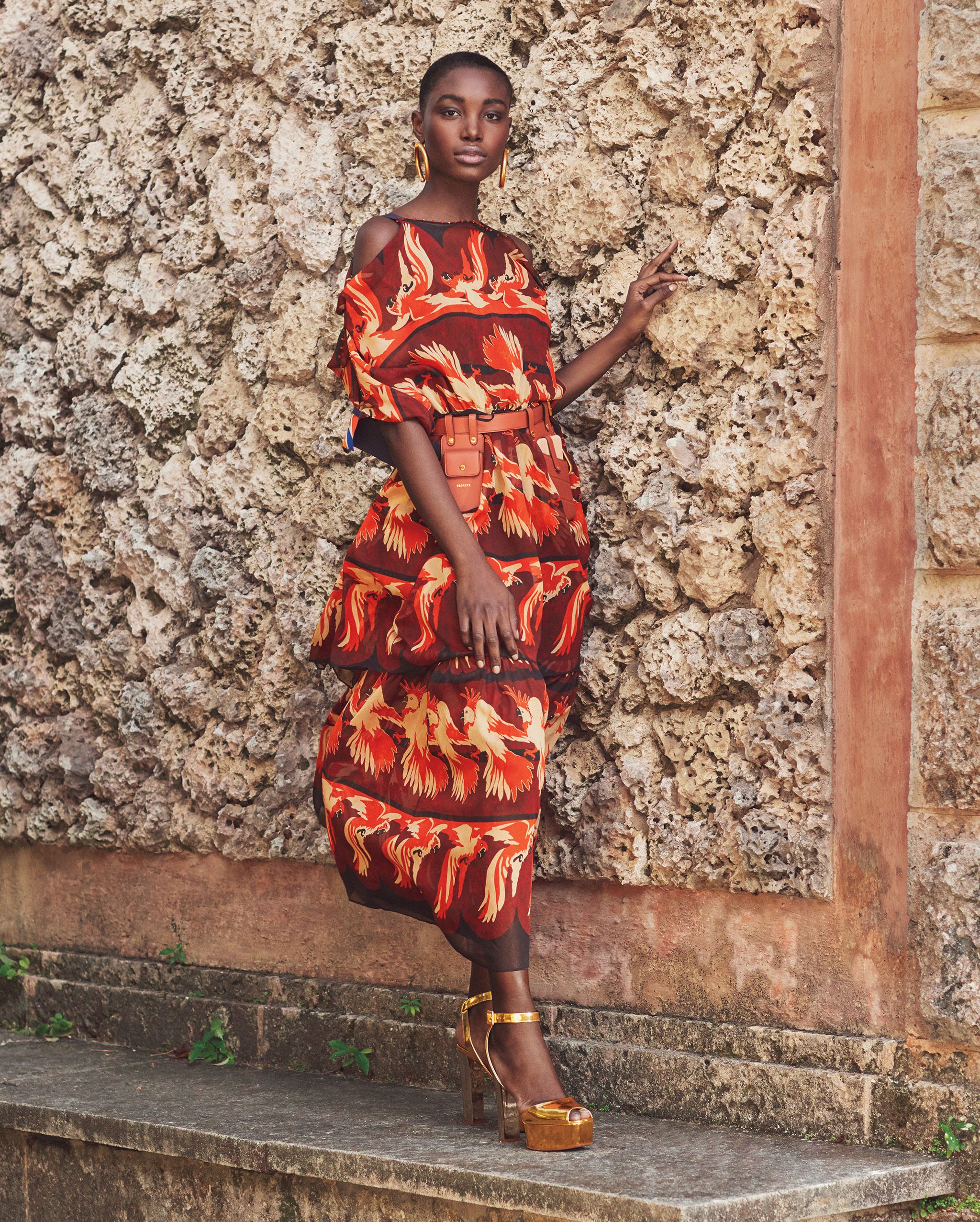 Fendi printed silk dress and leather belt bag, 305.861.7114, Giuseppe Zanotti gold and silver platform sandals, 305.868.0133.