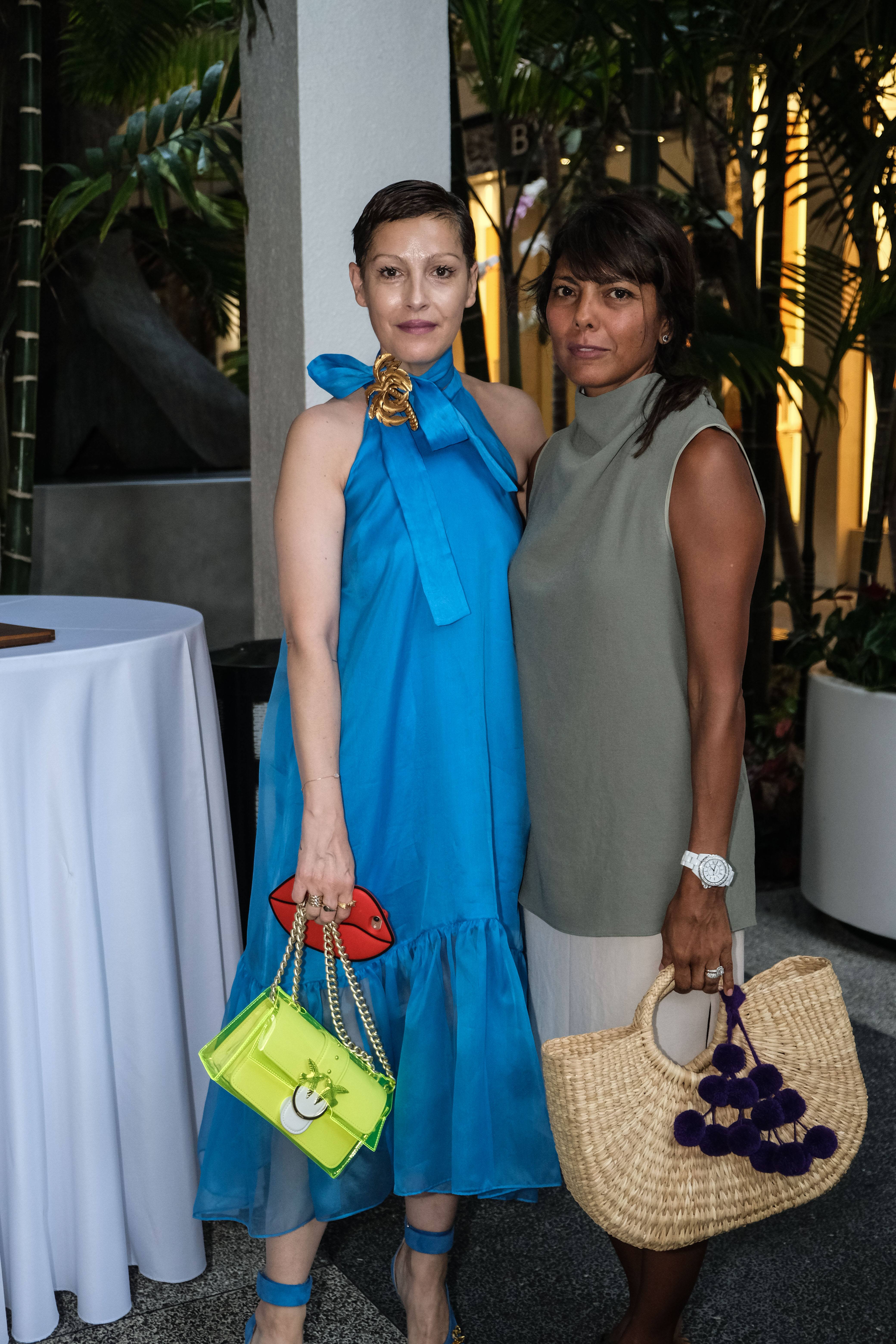 Angeles Almuna and Friend at Pinko Walk in the Garden Fashion Show