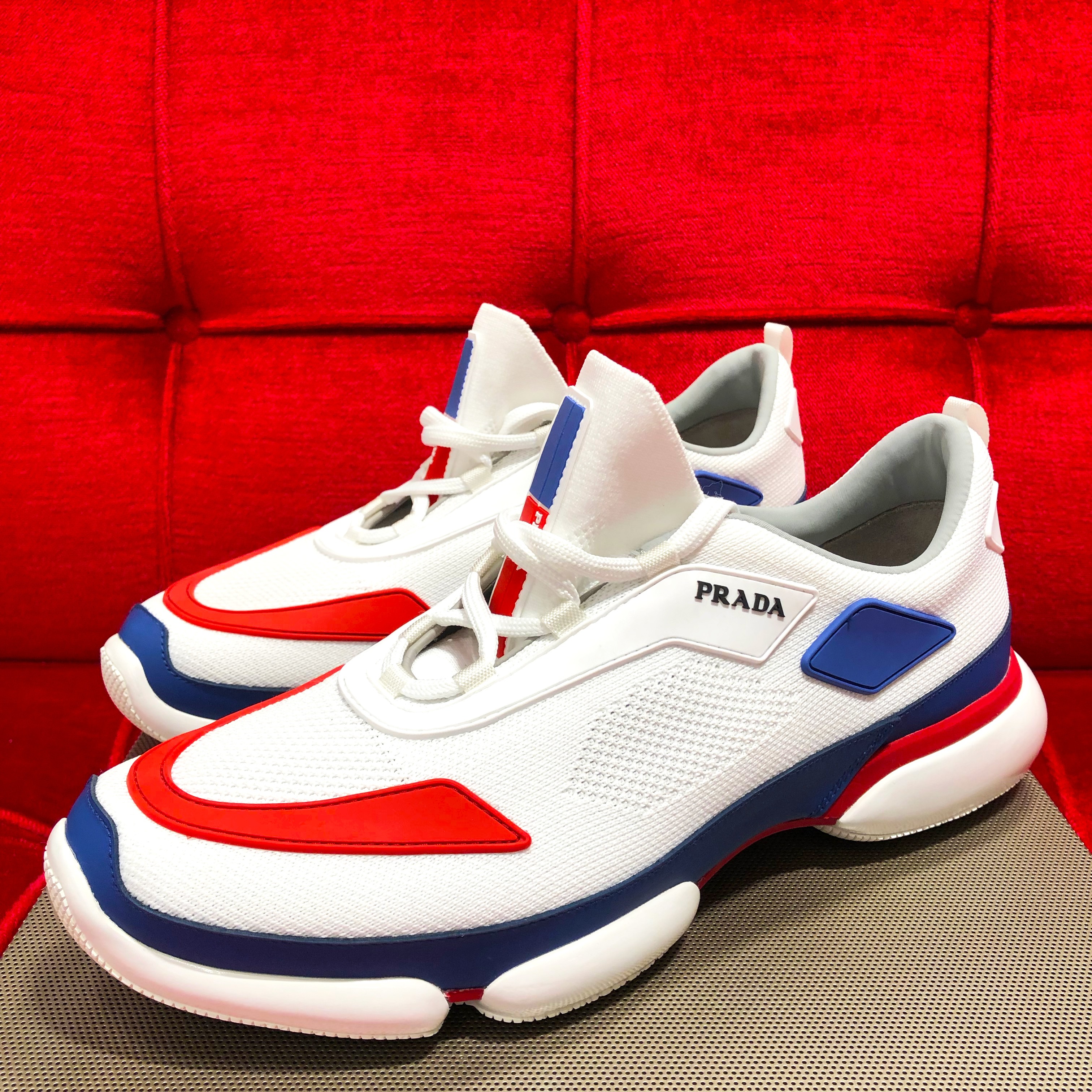 Prada knit fabric Cloudbust sneakers in white and red and blue accents