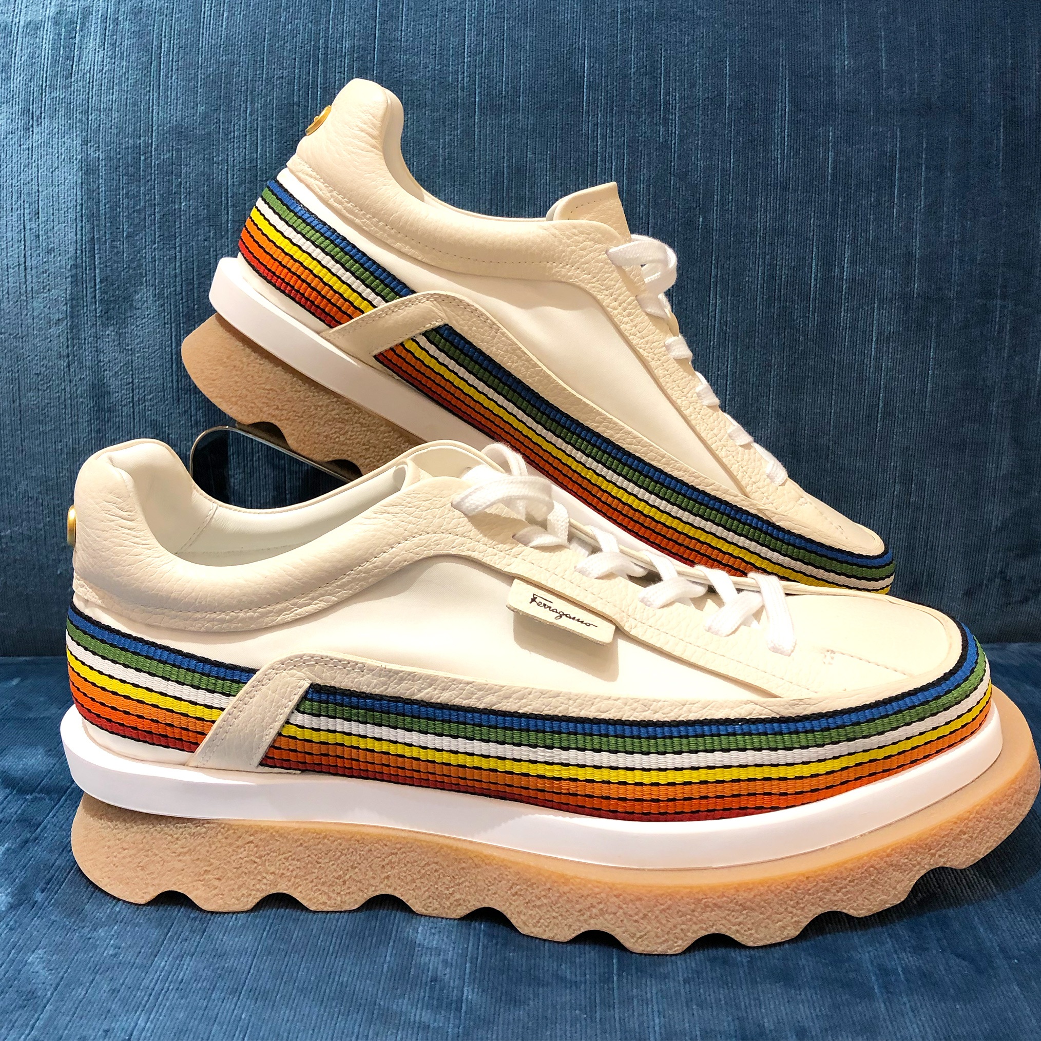 Salvatore Ferragamo Sustainable Thinking Sneaker is set on a thick rubber sole, they are adorned with rainbow pattern