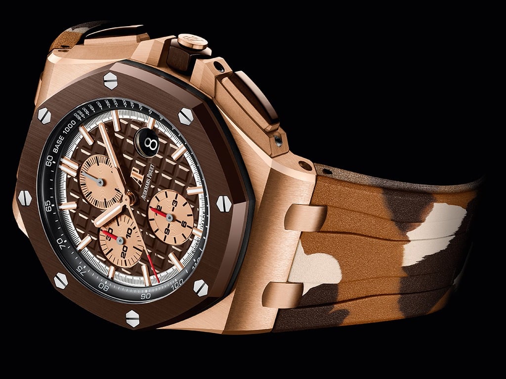 Audemars Piguet Royal Oak Offshore Selfwinding Chronograph with 8-carat pink gold case adorned by a brown ceramic bezel, crown and pushpieces, as well as a brown "Méga Tapisserie" dial and a camouflage rubber strap.