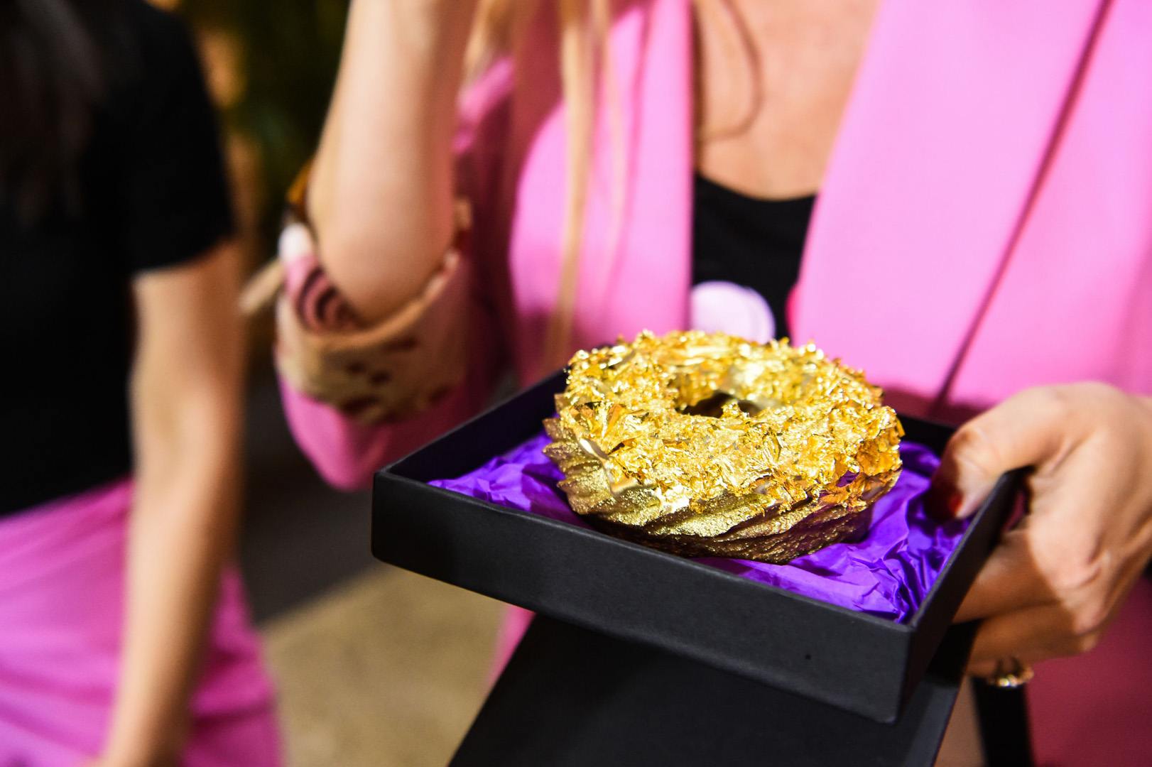 24K gold doughnut auction item at Puppy Love event