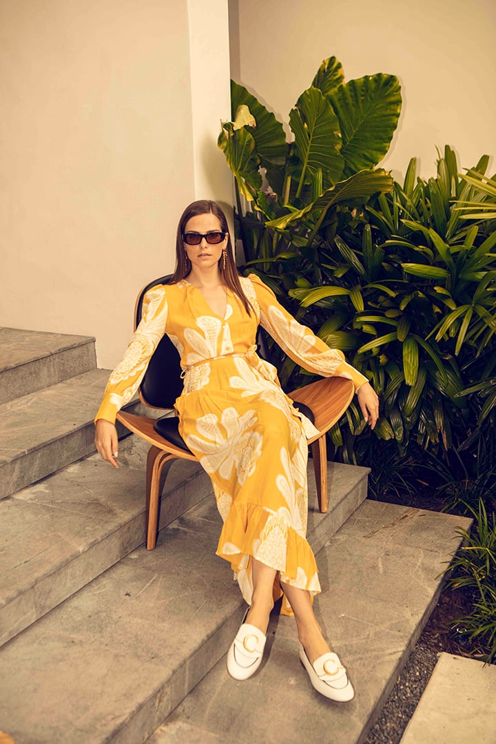 Look curated by The Webster, model in a La Double J dress, Chloé mules, Versace earrings and Port Tanger sunglasses