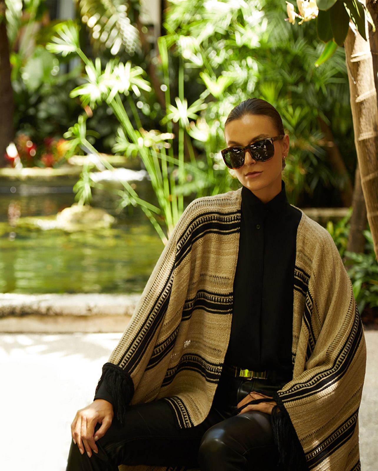 Ralph Lauren black silk shirt, tan and black wrap, black leather pants and black belt with silver hardware