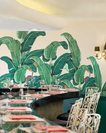 The famous Fountain Coffee Room at the Beverly Hills Hotel, boasting the original banana leaf print wallpaper designed by Albert Stockdale in 1942.