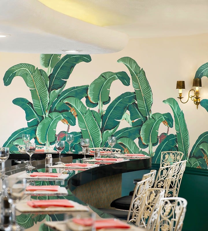 The famous Fountain Coffee Room at the Beverly Hills Hotel, boasting the original banana leaf print wallpaper designed by Albert Stockdale in 1942.