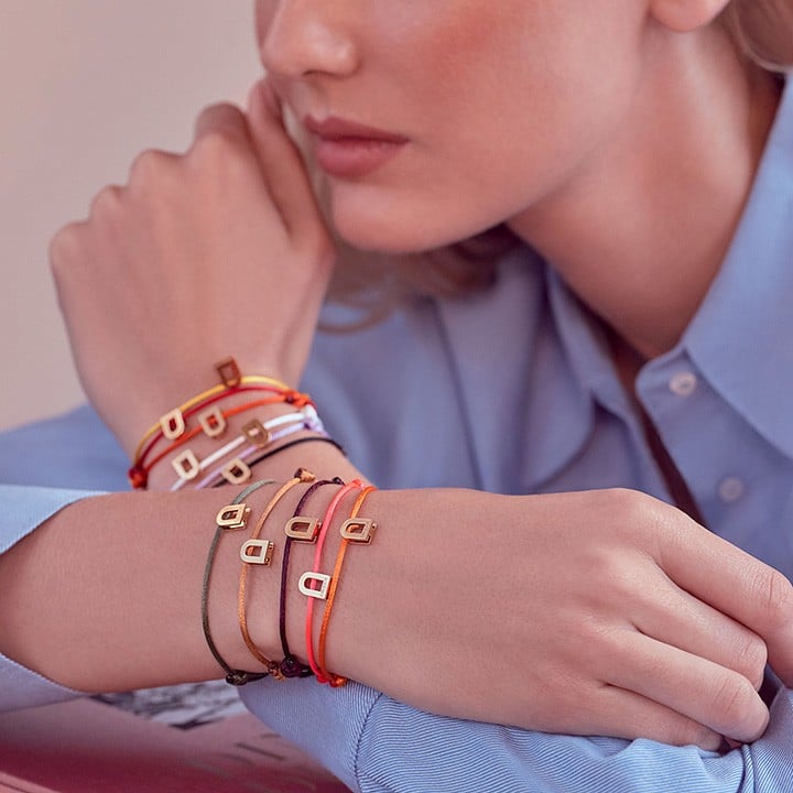 L'Arc Voyage Charm PM, 18k Rose Gold on Silk Cord Bracelet.