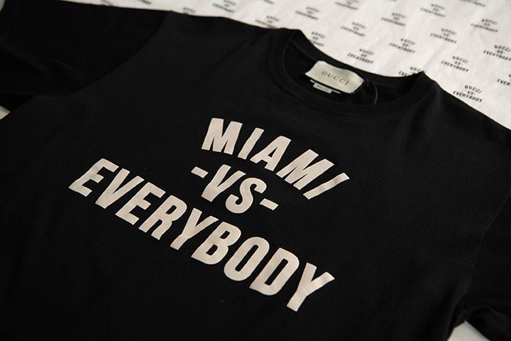 The Gucci Changemakers collaboration “MIAMI VS. EVERYBODY” T-shirt is exclusively available at Gucci Gucci Bal Harbour Shops.