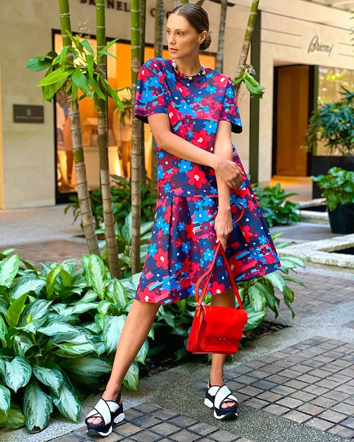 Marni Rainbow Flower-printed poplin shirt and skirt, Trunk bag and white wedge sandals.