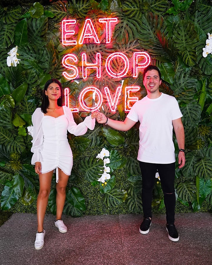 Nico Norena and Ariana Rueda at our EAT SHOPS LOVE Instagrammable Wall Installation on Level 3 of Bal Harbour Shops.