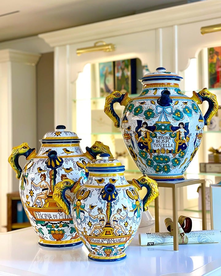 Santa Maria Novella ceramic vases with multi-colored decorations.