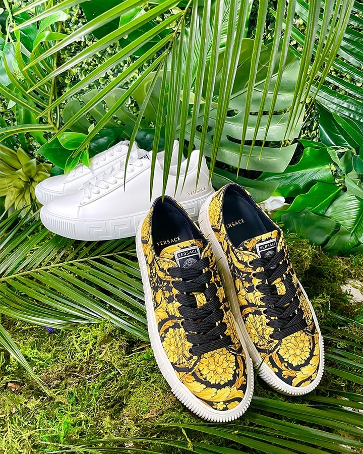Versace Greca Barocco print sneakers (in black and white) available at Versace Bal Harbour.