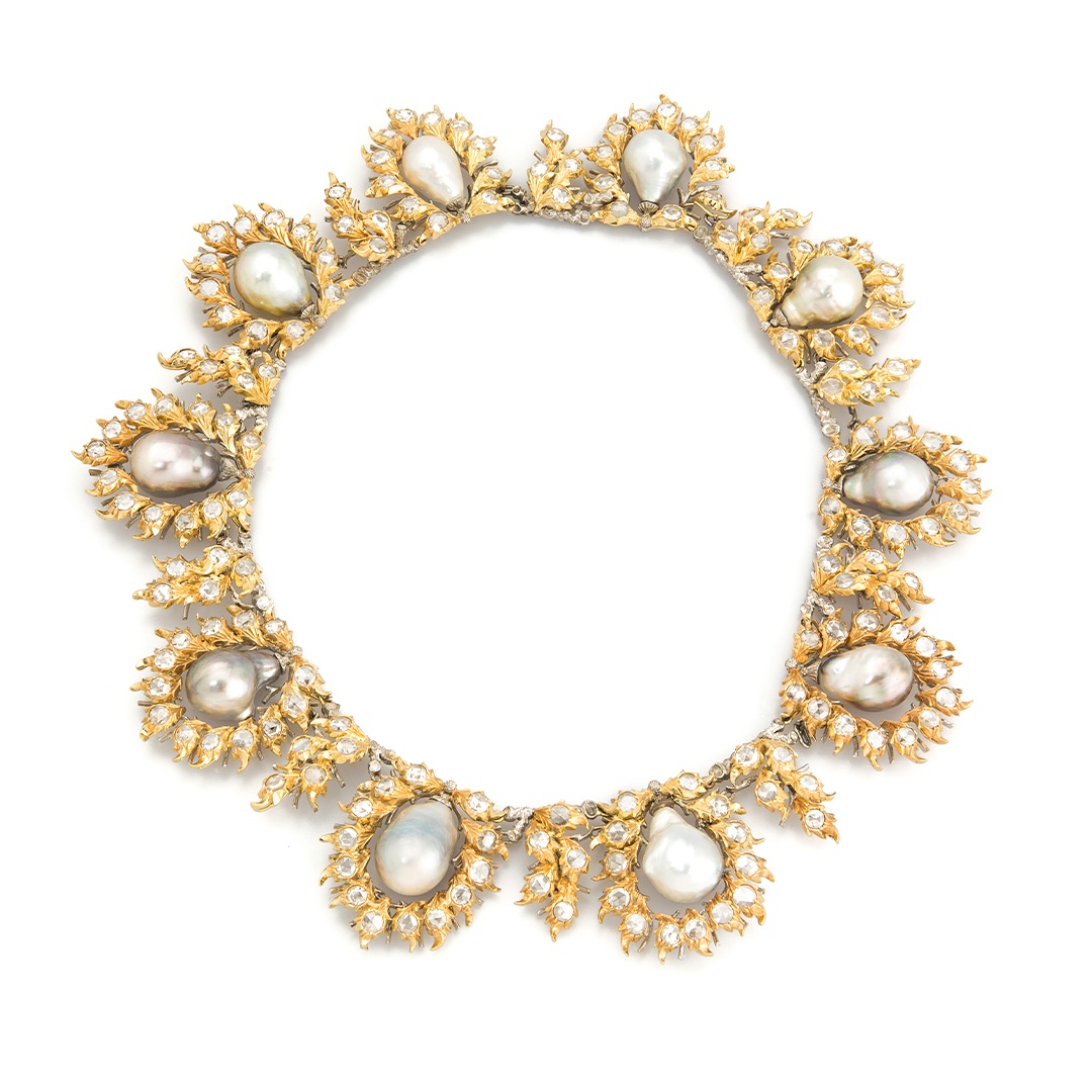 Buccellati Prestigio necklace with 10 baroque South Sea pearls surrounded by textured and engraved gold leaves and set with rose cut diamonds.