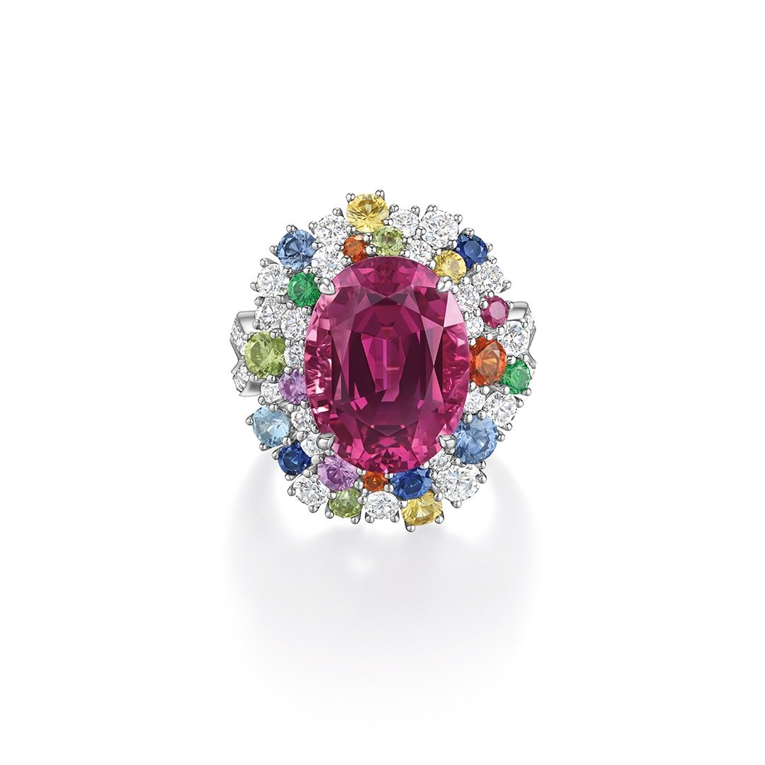 Harry Winston Candy pink spinel cocktail ring with aquamarines, blue, pink and yellow sapphires, peridot, tsavorite, spessartite garnet and diamonds.