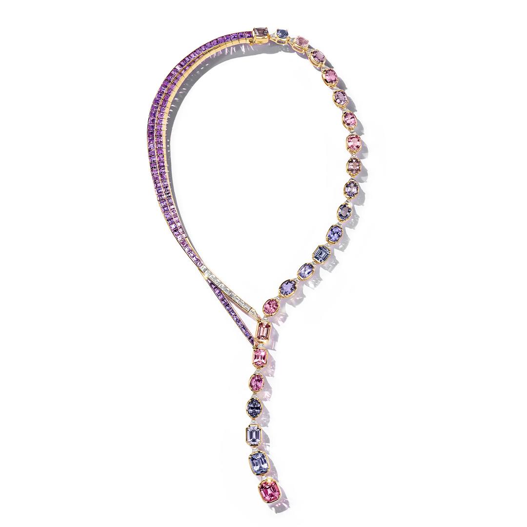 Tiffany & Co Lariat necklace with more than 81 carats of blue, purple and pink spinels that connect around the neck to a strand of diamonds and purple sapphires.