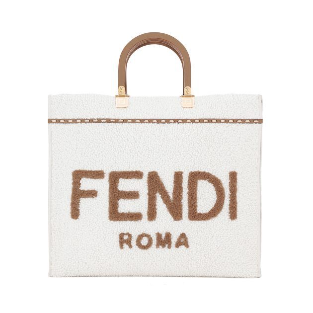 Fendi large cream colored tote with brown Fendi lettering, gold hardware and brown leather top handle