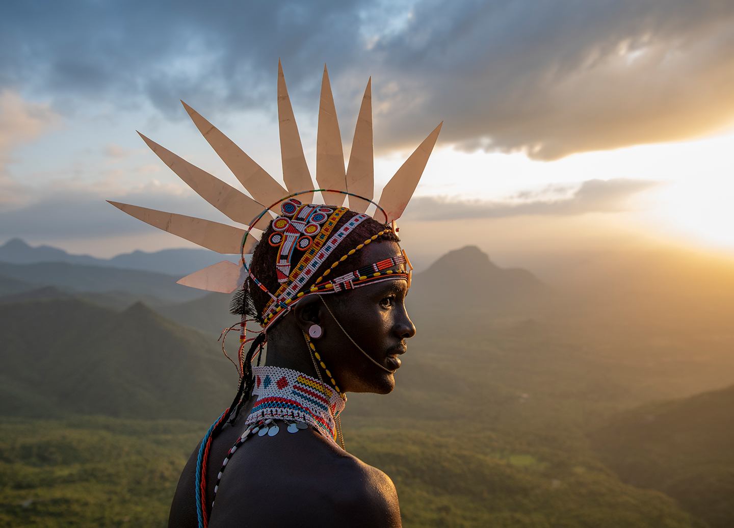 Samburu John Nkuus Leripe watches the sun rise over the Mathews Range in northern Kenya’s Namunyak Wildlife Conservancy