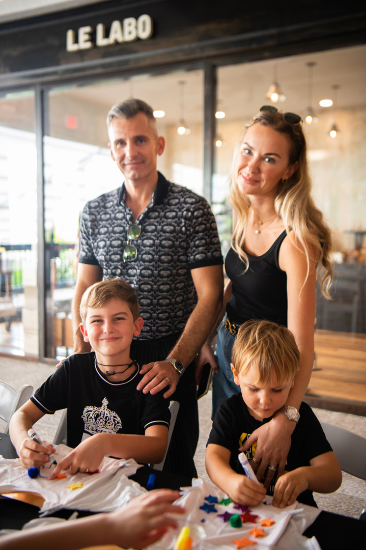 Andrey Belitsky, Valerie Belitsky smile with their two sons