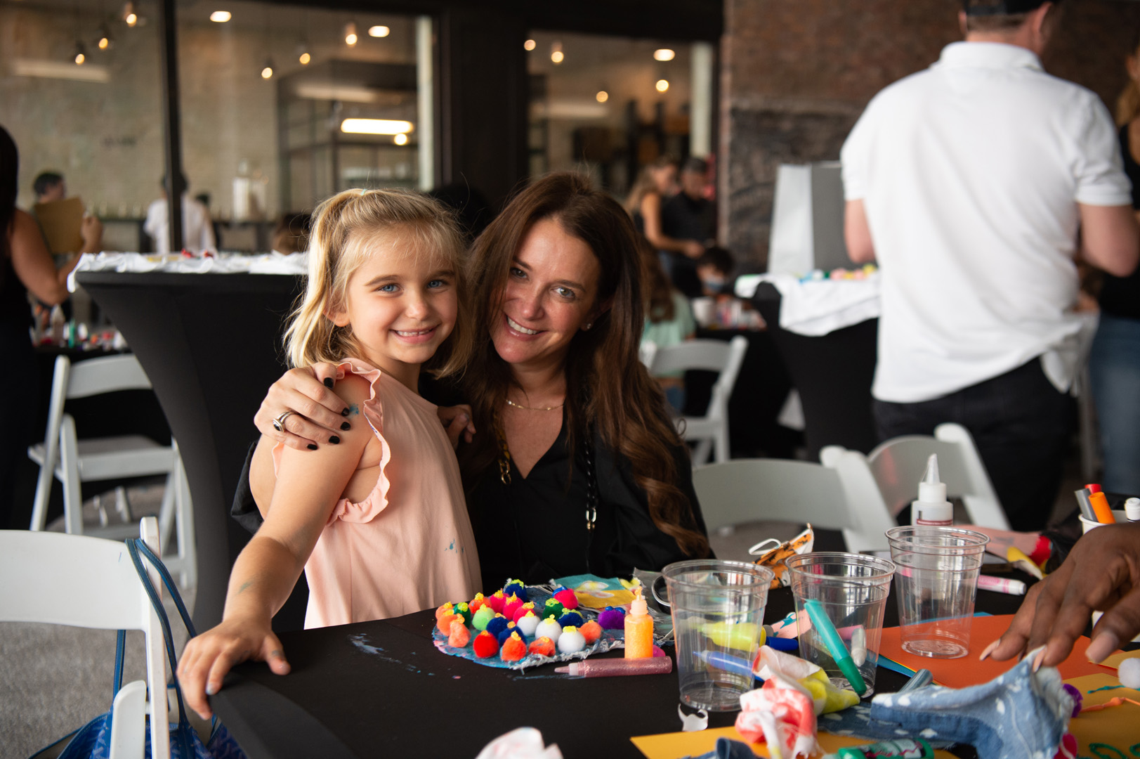 Amy Derosa smiles with her daughter