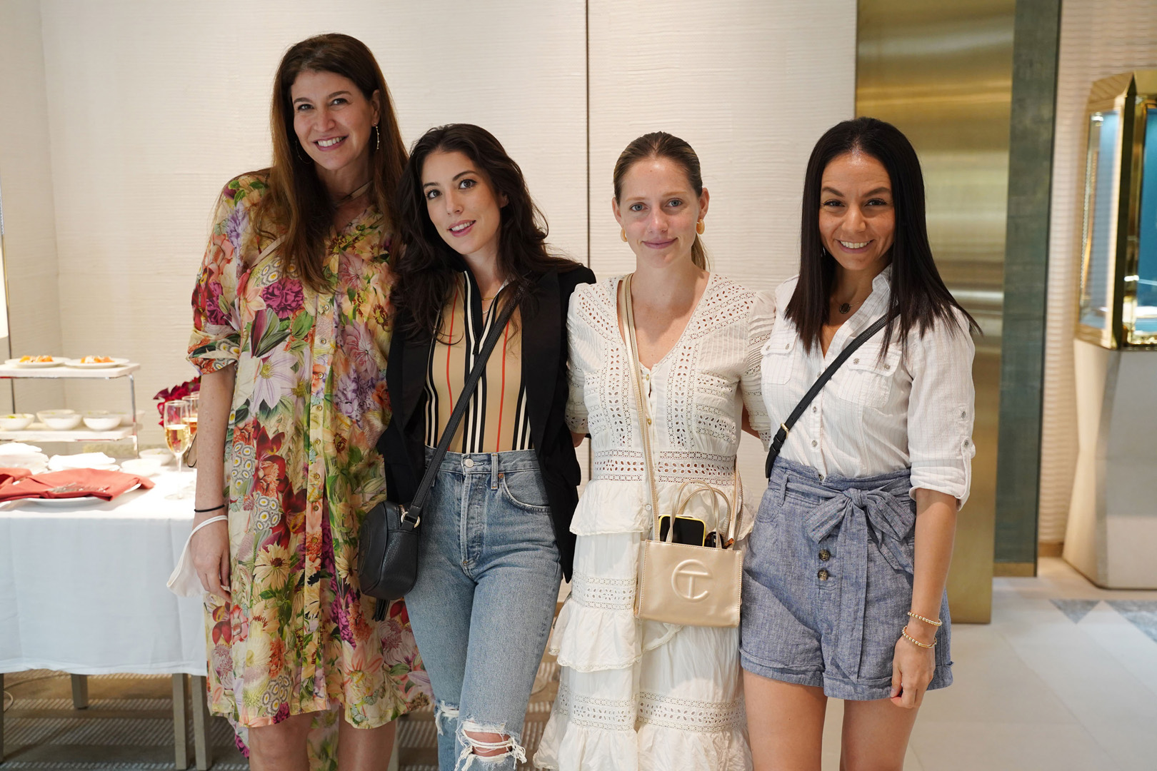 Carolyn Travis, Shana Kaufman, Ashley Knott and Gotmar Giron pose for a photo