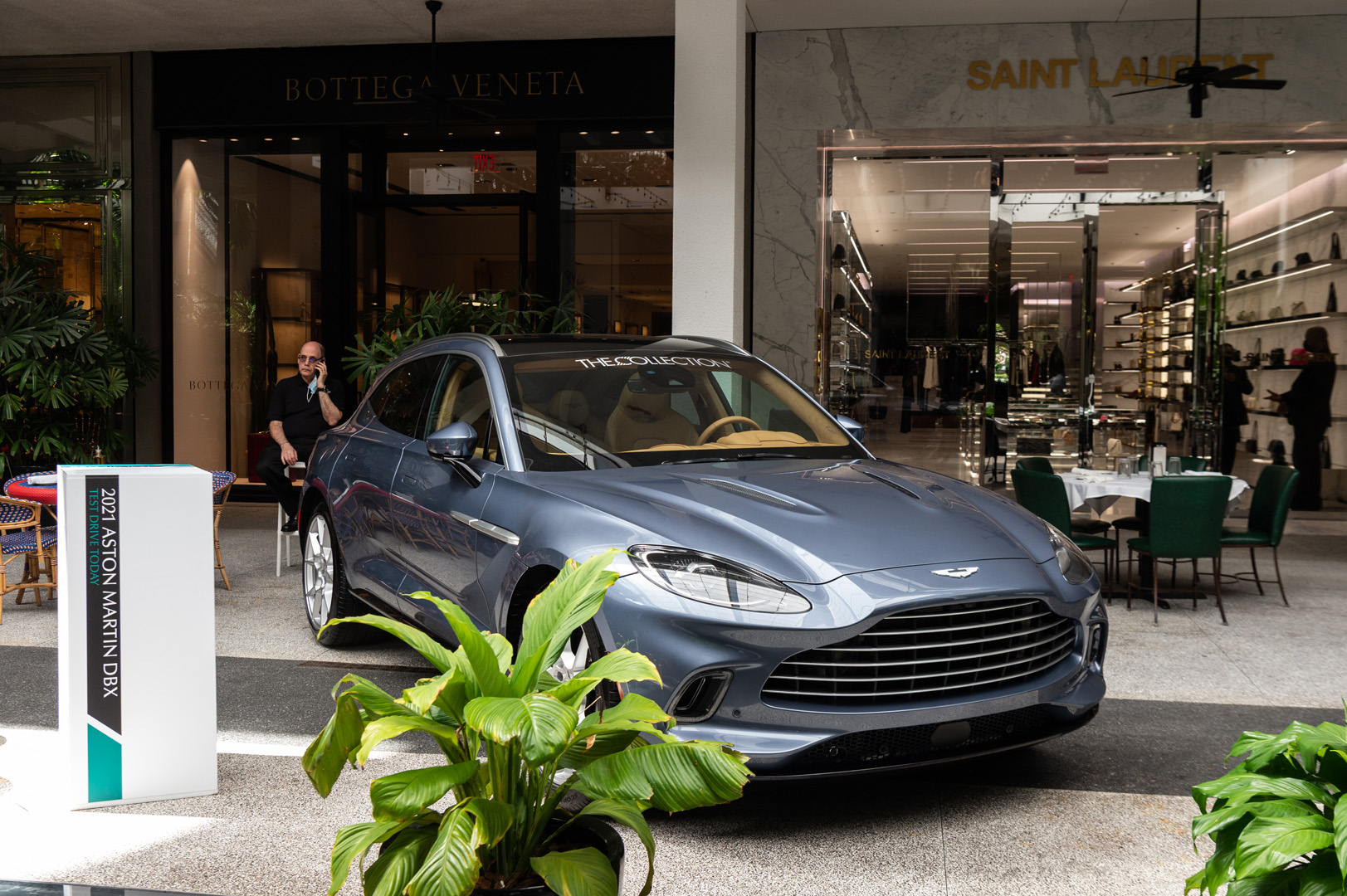 Aston Martin DBX parked in the Bal Harbour Shops courtyard