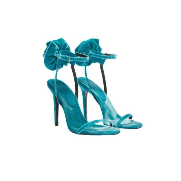Blue velvet heels with rose detail on the heel