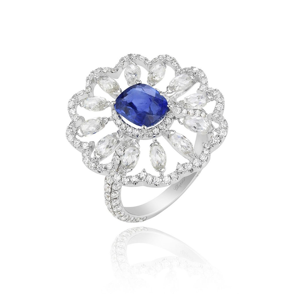 Diamond ring with blue gem