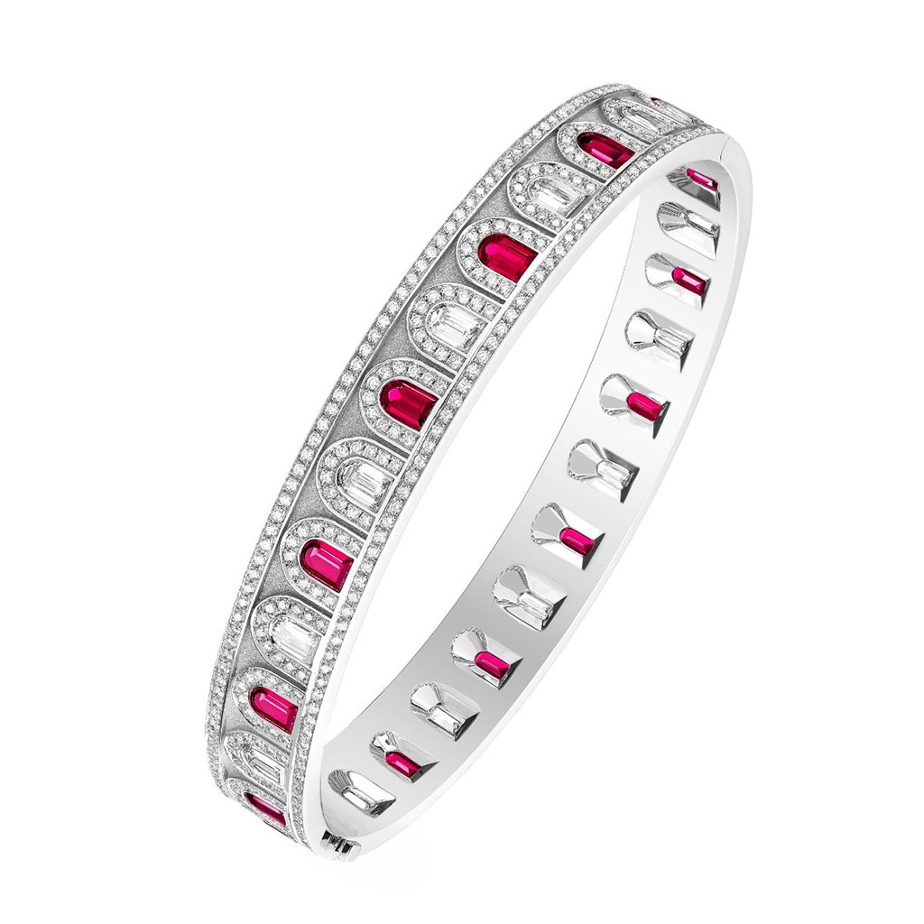 Silver bangle bracelet with pink detail