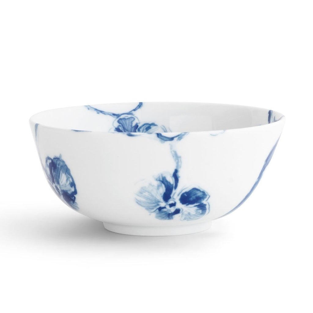 Large white bowl with blue orchid flowers