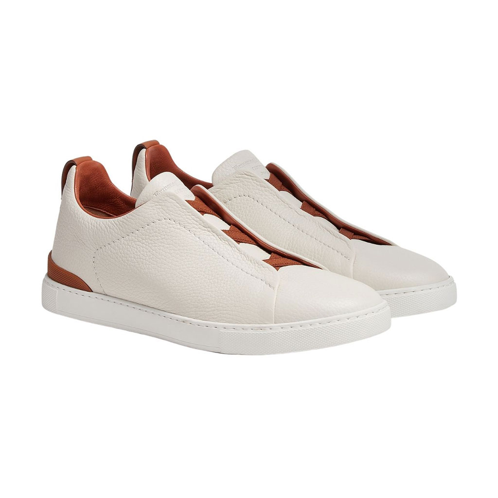 White and brown leather sneakers