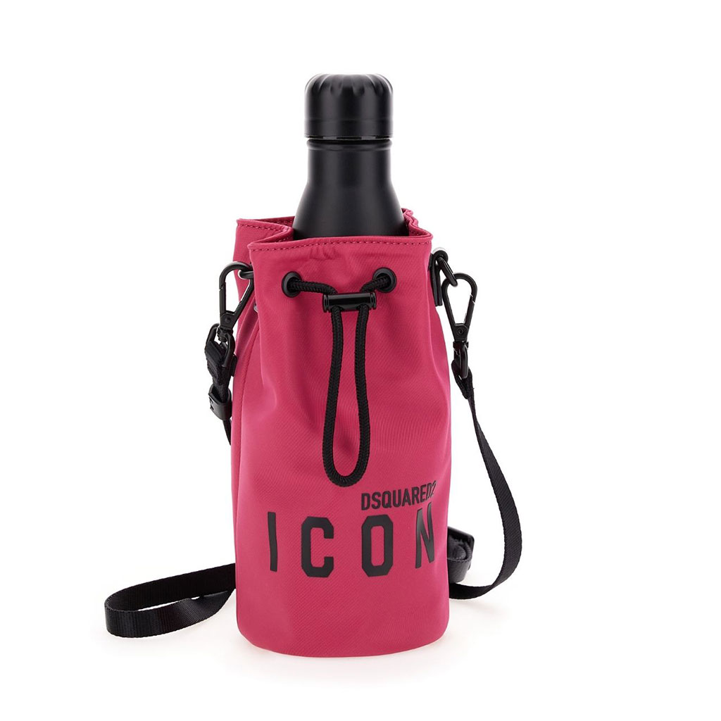 Pink bottle bag with draw string and Icon label in front with long cross-body black strap.