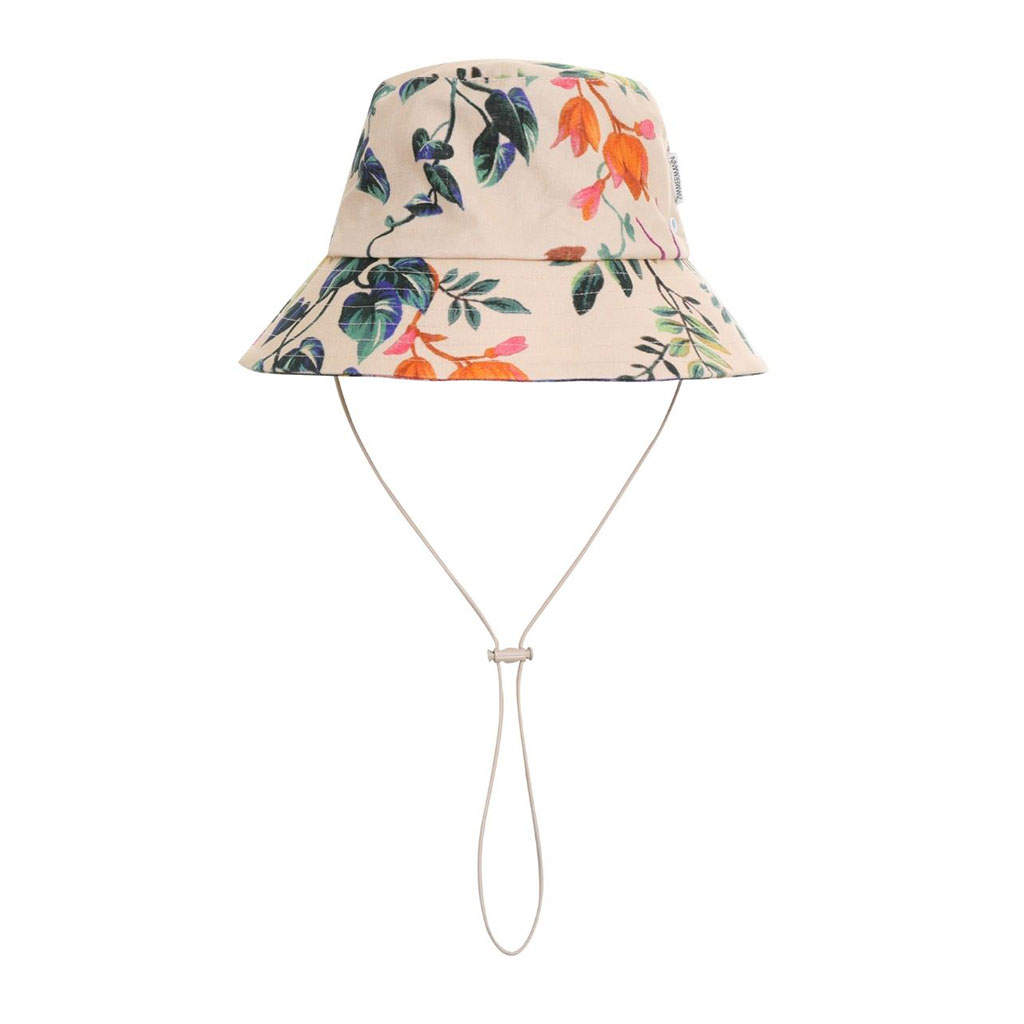 Cream colored bucket hat with tropical floral pattern and neck string.