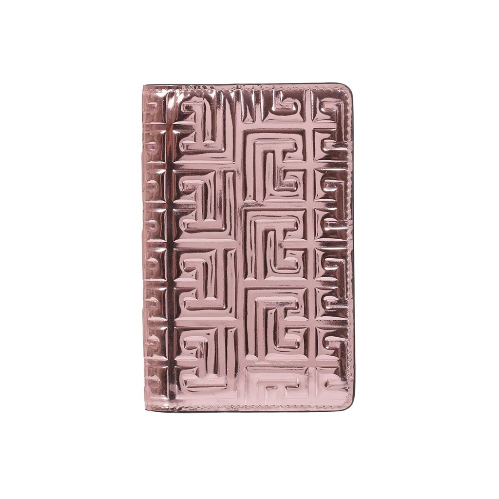Pink bi-fold metallic passport cover.