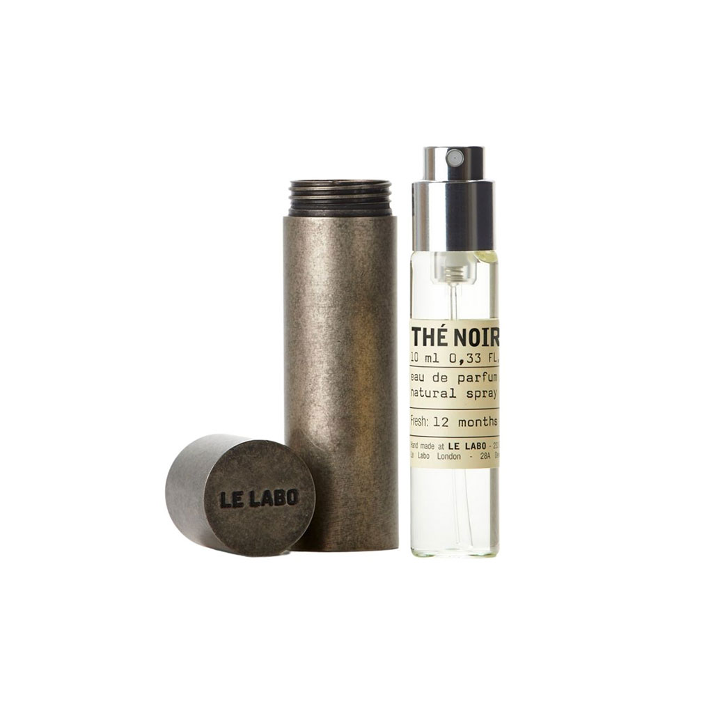 Le Labo metal travel tube with Noir 29 travel size fragrance.