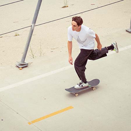 Man skateboarding in Golden Goose sneakers