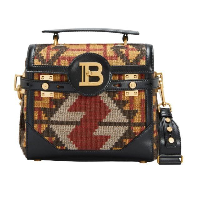 Black top crossbody bag with aztec pattern detailing and gold hardware