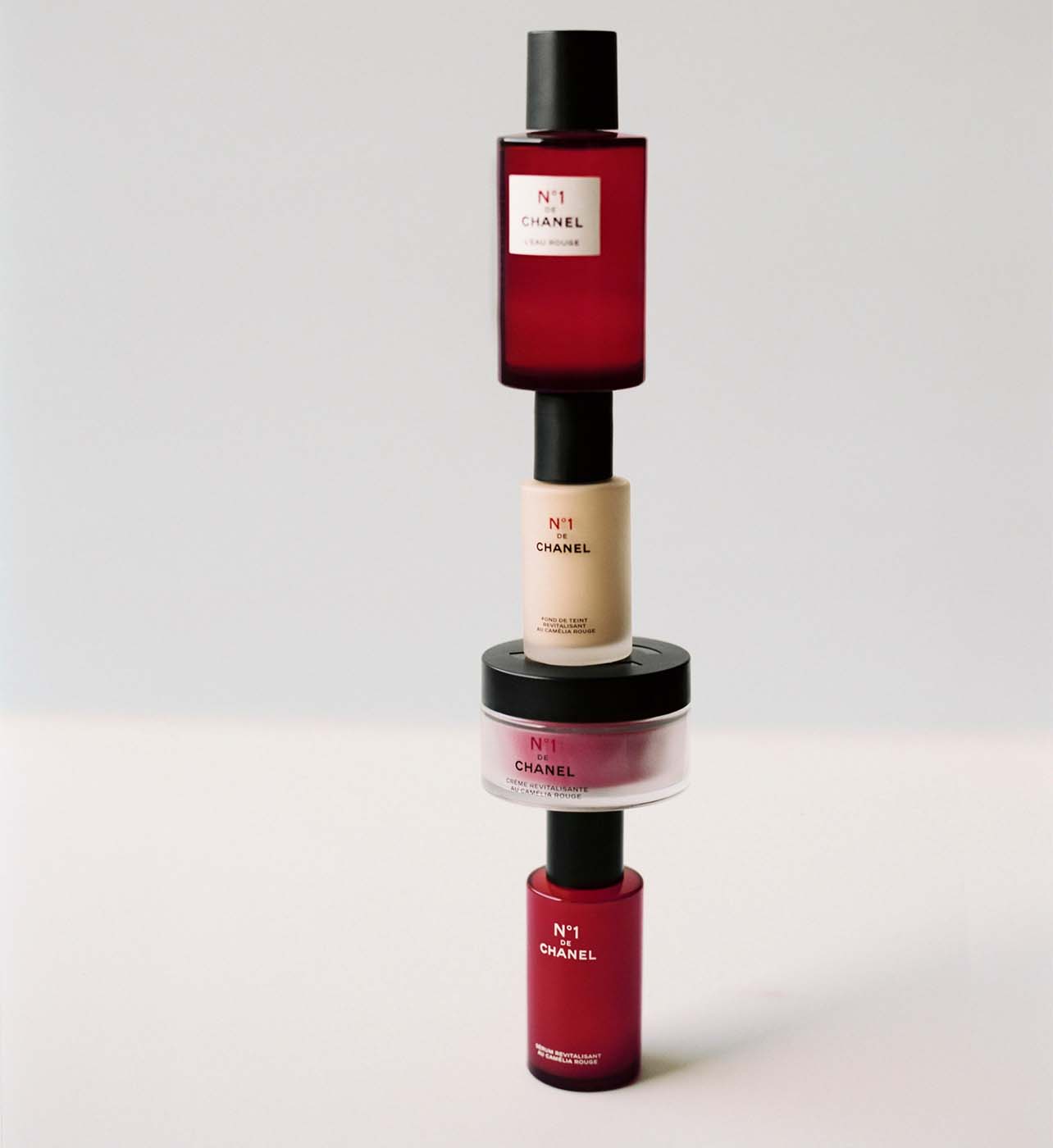 a combination of Chanel beauty and skin products stacked on top of each other